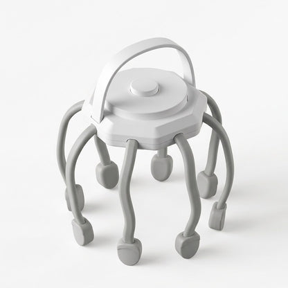 The white electric scalp massager seen from a higher angle