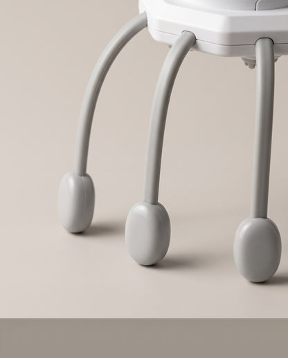 Close view of the scalp massager's legs and rounded tips