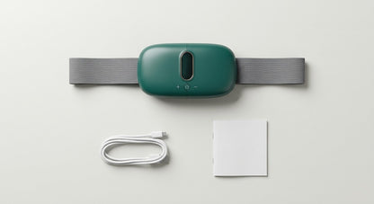 Flat lay of the waist massager, USB charging cable and user manual