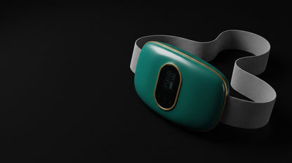 The teal-green waist massager lit against a black background